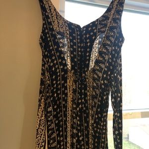 Beautiful, formal, Pleated pantsuit!  Open back with straps to tie in back.